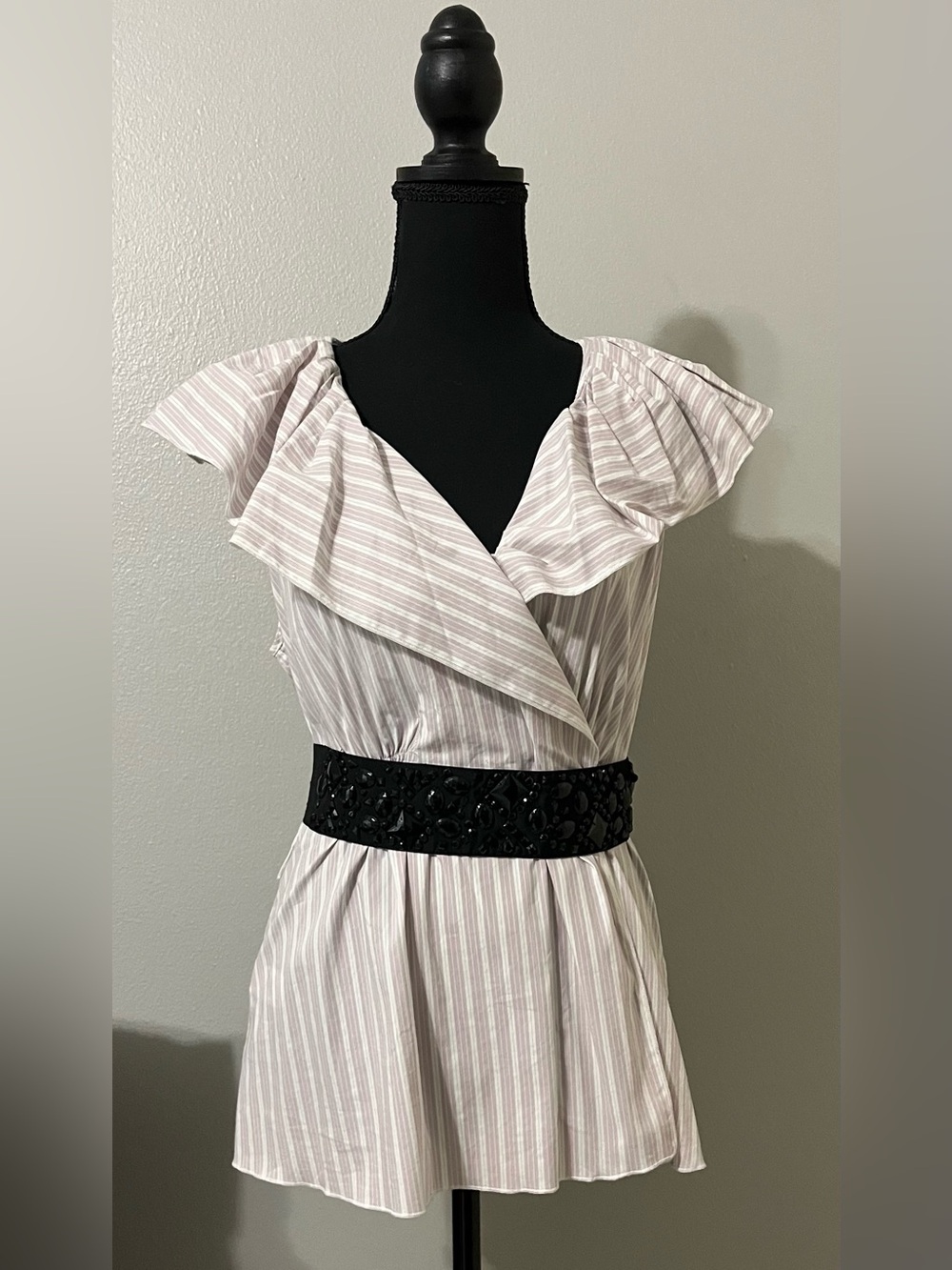 BCBGMAXAZRIA top with elasticized belt. Pre-Owned Condition-Good.